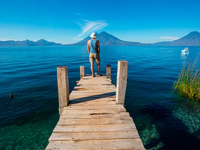Man looking out over Lake Atitlán in Guatemala