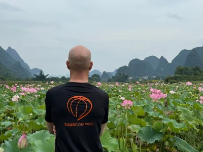 Claus looks out over the fields in Yangshuo, China