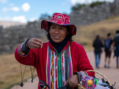 Local woman in Cusco, Peru, selling locally produced jewellery