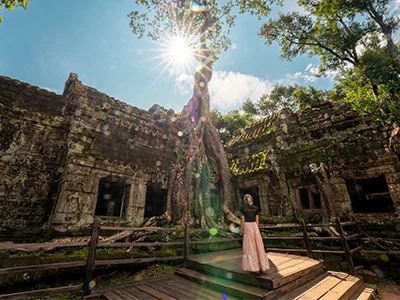 A woman explores Angkor Wat in Cambodia