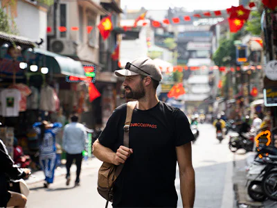 Man walking down a street in Hanoi, Vietnam