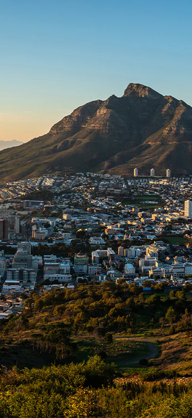 Cape Town seen from above, bathed in the glow of sunset