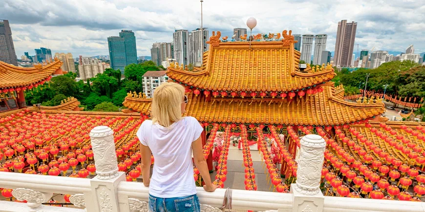 Woman looking out over Thean Hou Temple in Kuala Lumpur