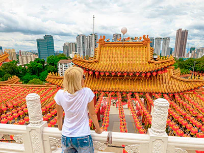 Woman looking out over Thean Hou Temple in Kuala Lumpur