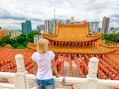 Woman looking out over Thean Hou Temple in Kuala Lumpur