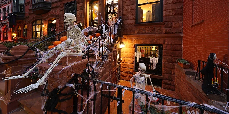House decorated with skeletons for Halloween in New York