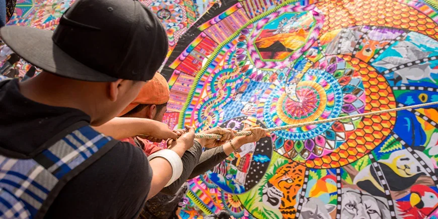 Two men building giant kites during a festival in Guatemala