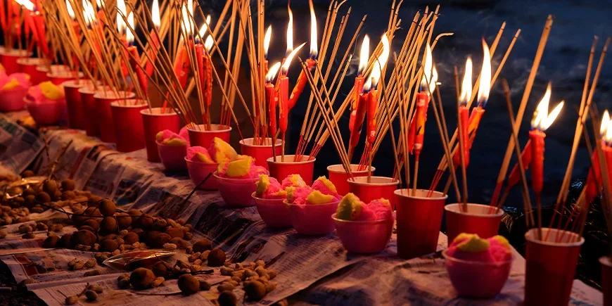Incense and ghost money being burned during the Hungry Ghost Festival in China