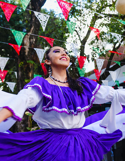 Woman in colourful traditional Mexican dress
