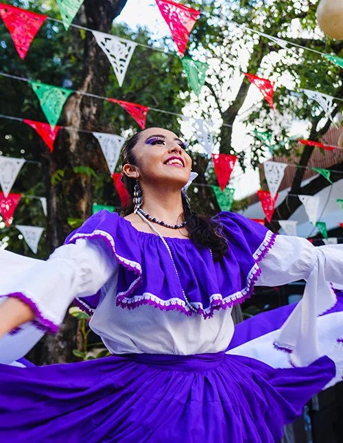 Woman in colourful traditional Mexican dress