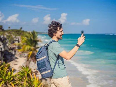 Man taking photos of the surroundings in Tulum, Mexico