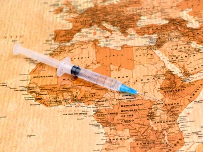Map of Africa and a syringe