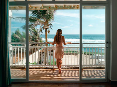 Woman looking at the view at a hotel in Sri Lanka