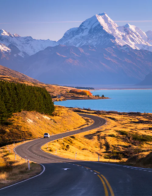 Mount Cook towers above the blue waters of Lake Pukaki on New Zealand's South Island.
