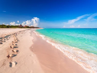Footprints in the sand at Playa del Carmen