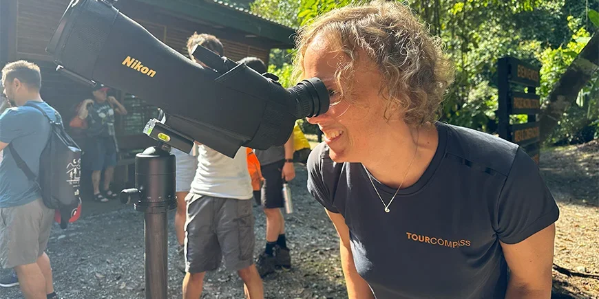 Meike scanning for wildlife with binoculars in Corcovado