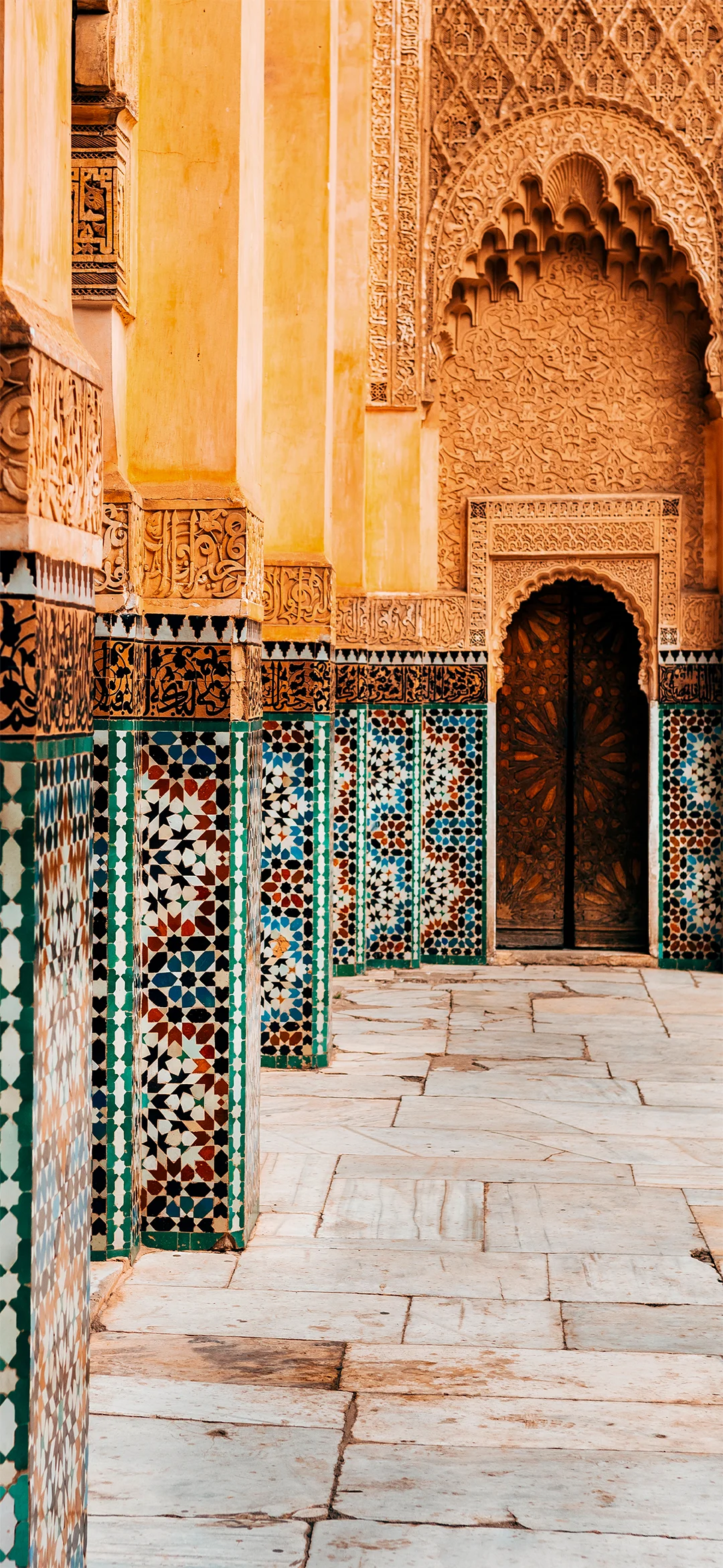 Colorful ornamental tiles at moroccan courtyard
