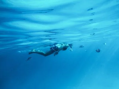 Woman snorkelling in Zanzibar
