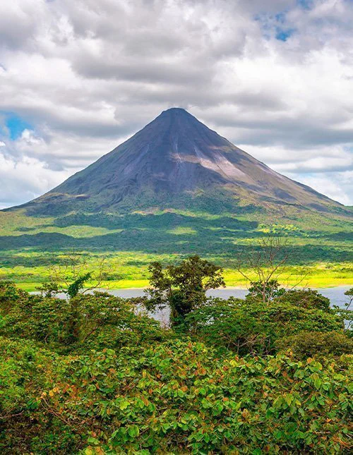 Amazing view of beautiful nature of Costa Rica with smoking volcano Arenal background